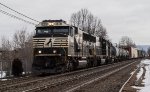 NS 6910 leads short manifest freight of cars headed to the C&F secondary